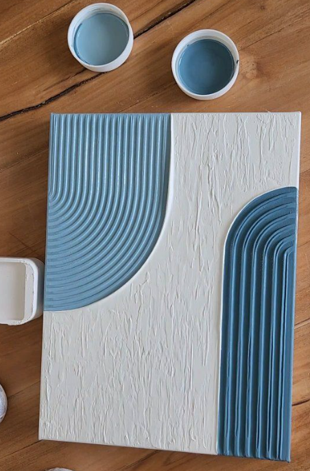 Toile textured art géométrique bleue et blanche en relief